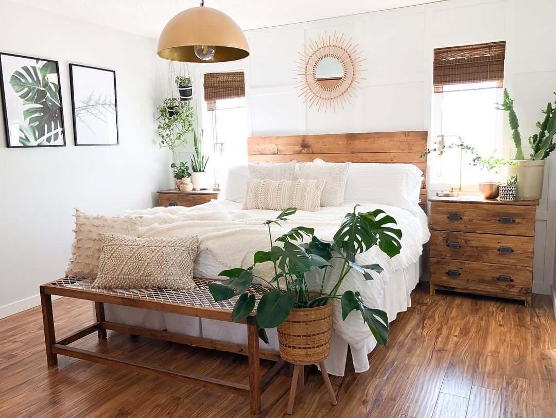 Sunburst Mirror Adds a Bohemian Focal Point Above the Bed