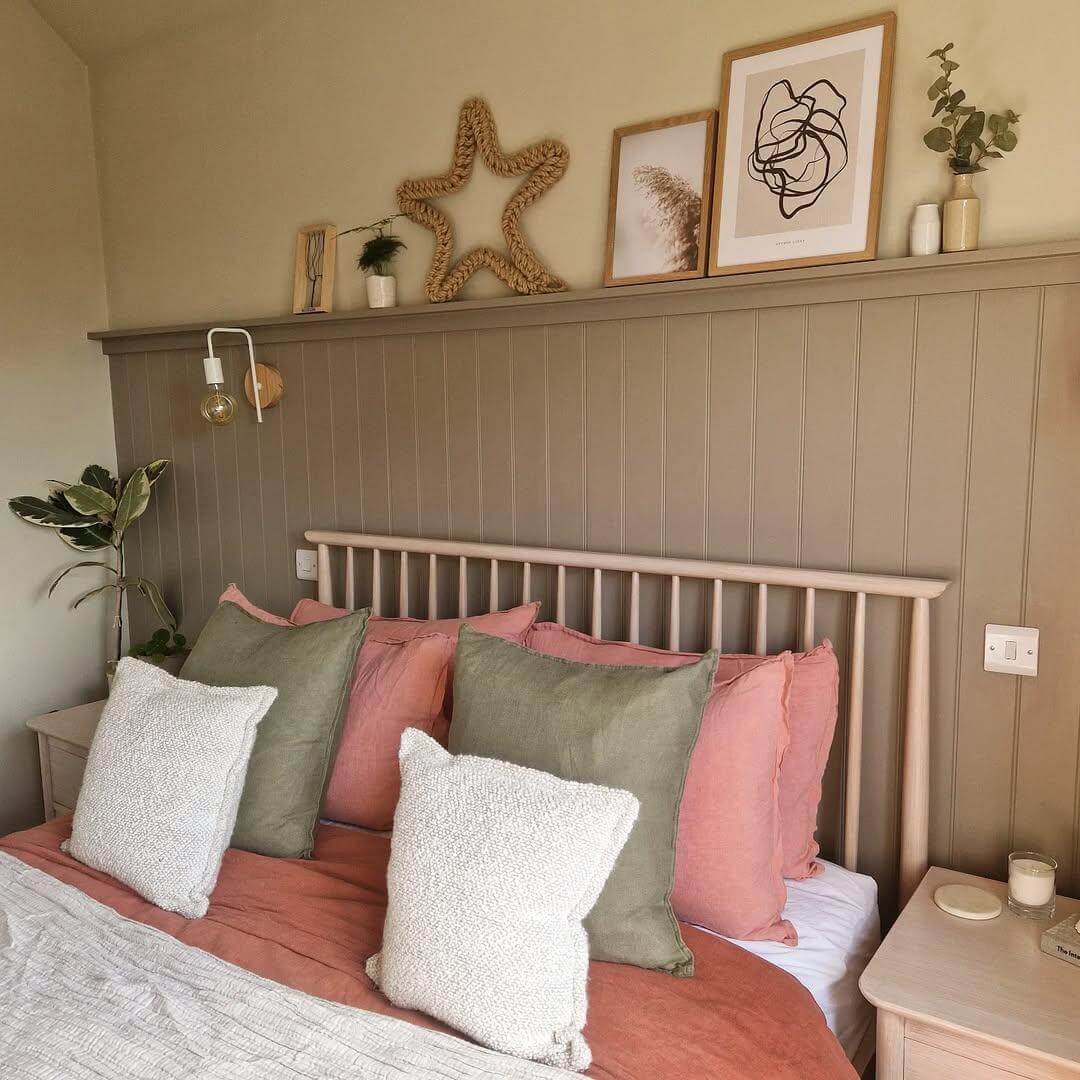 Textured woven star art adds a whimsical focal point above the bed