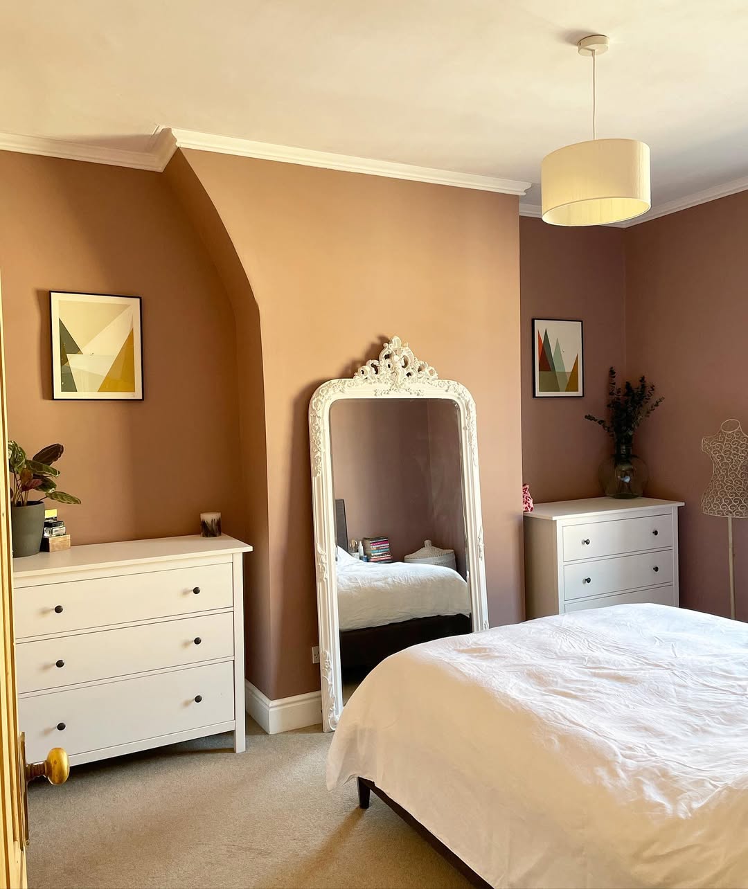 Ornate White Floor Mirror Adds Vintage Charm to Bedroom
