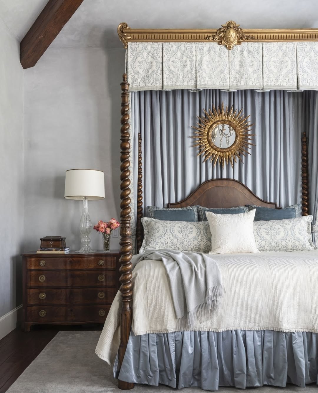Sunburst Mirror Adds a Golden Glow Above the Bed