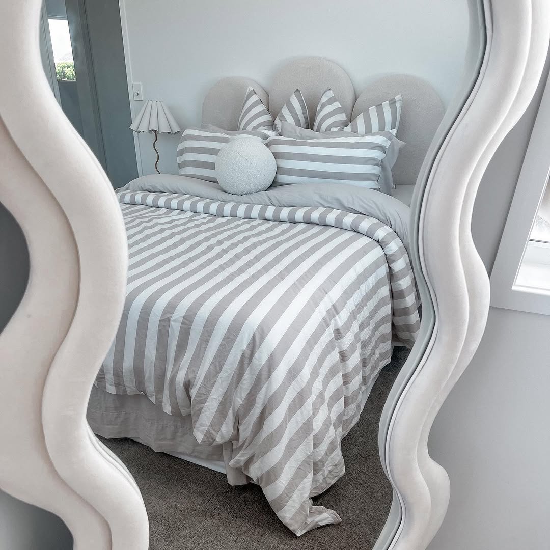 Sculptural Mirror Frame Adds Whimsical Dimension