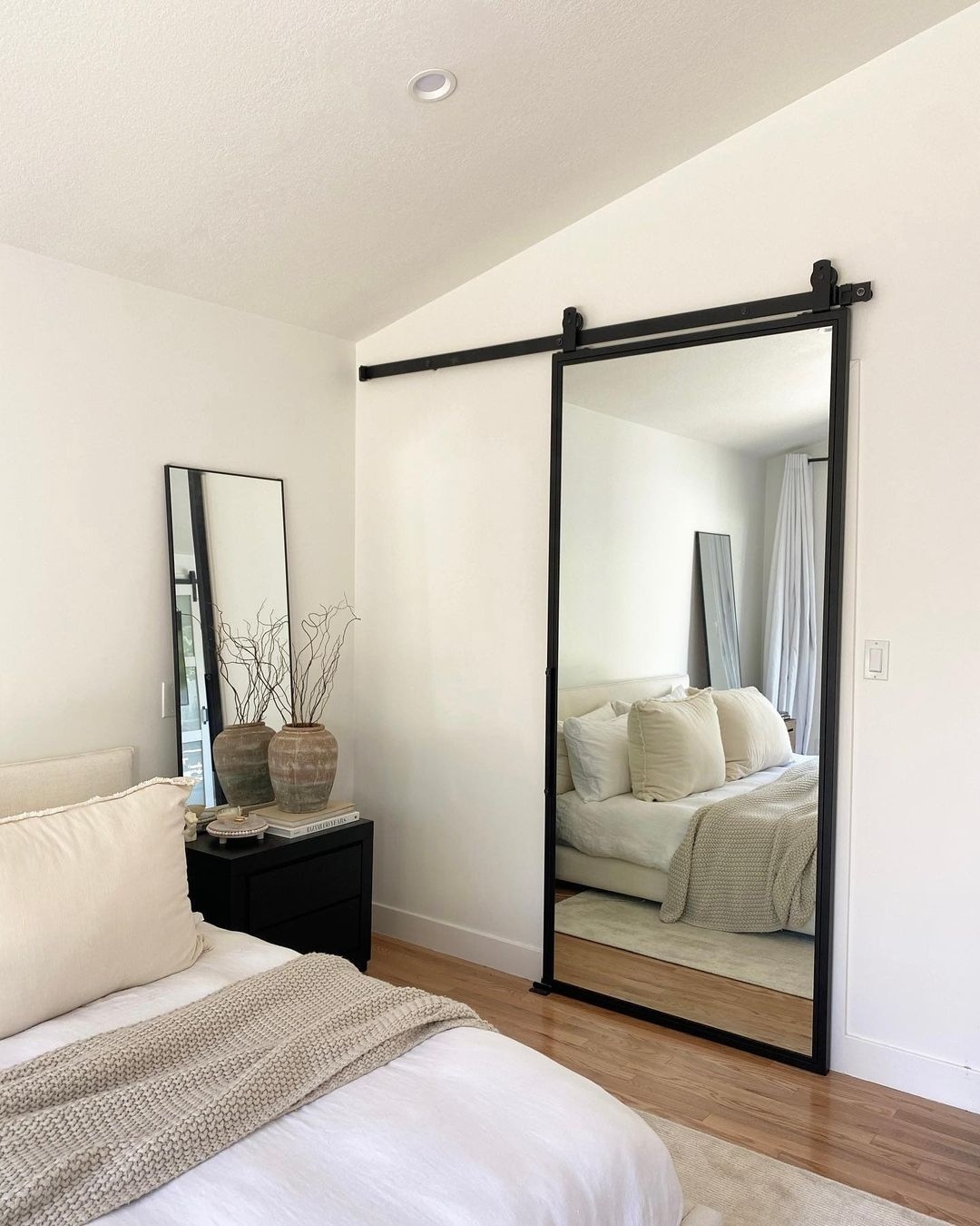 Maximize Light and Space with a Sliding Barn Door Mirror