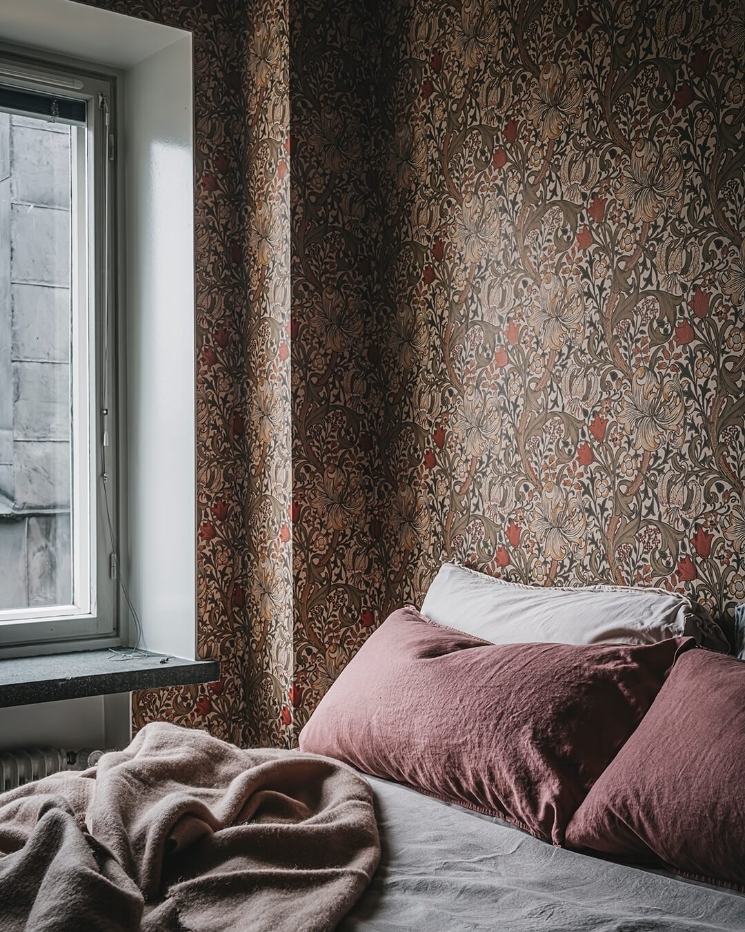 Vintage Floral Wallpaper Creates a Rich Bedroom Accent Wall