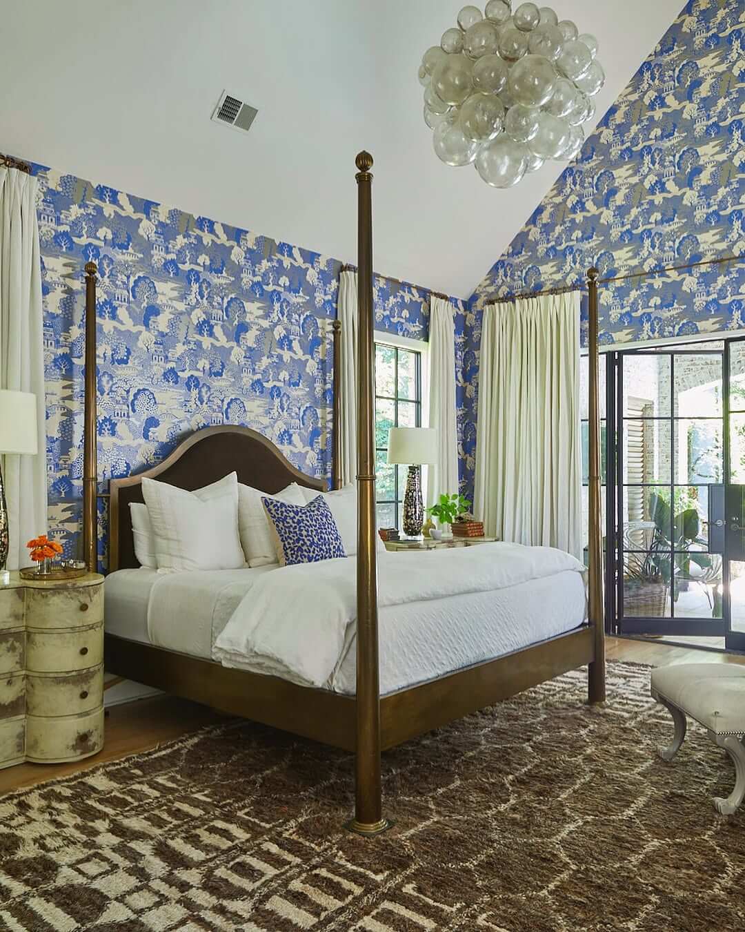 Toile Wallpaper Creates a Classic Blue and White Bedroom Accent Wall
