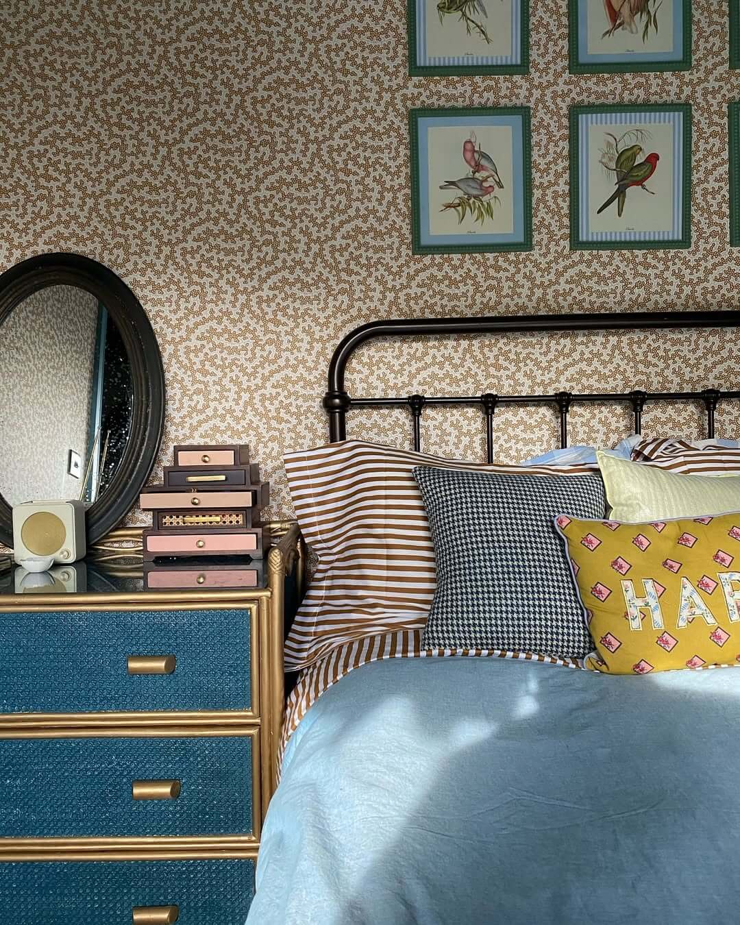 Small-Scale Patterned Wallpaper Creates a Cozy Bedroom
