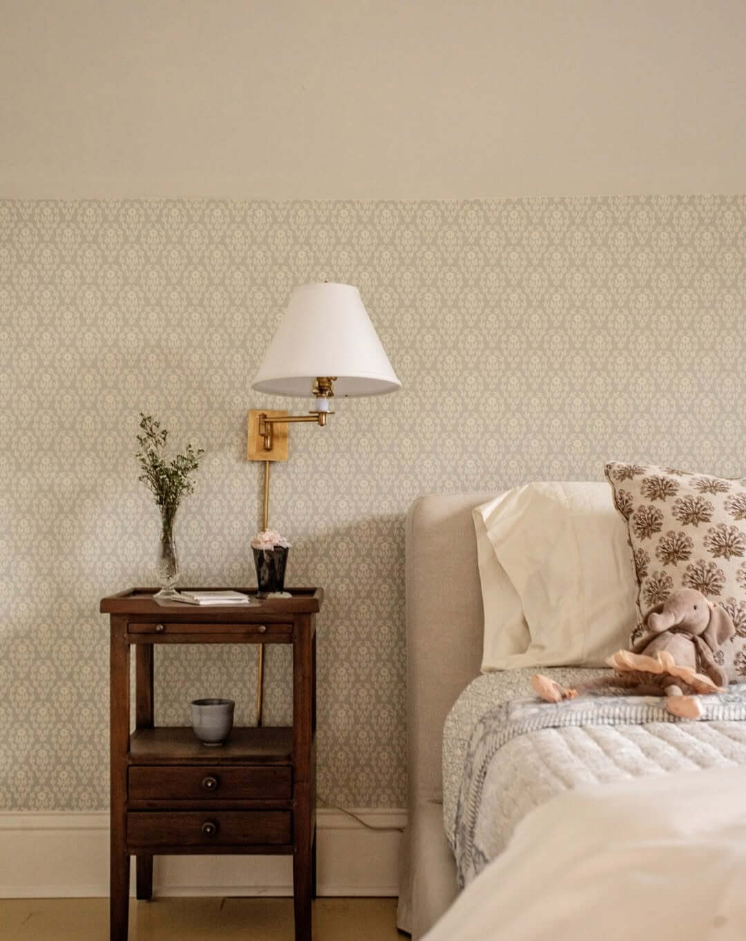 Delicate Damask Wallpaper Creates a Soft Bedroom Accent