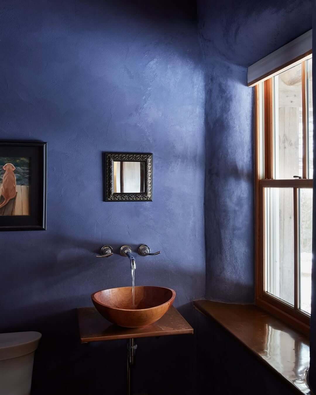 Textured Blue Walls Create a Moody, Atmospheric Bathroom