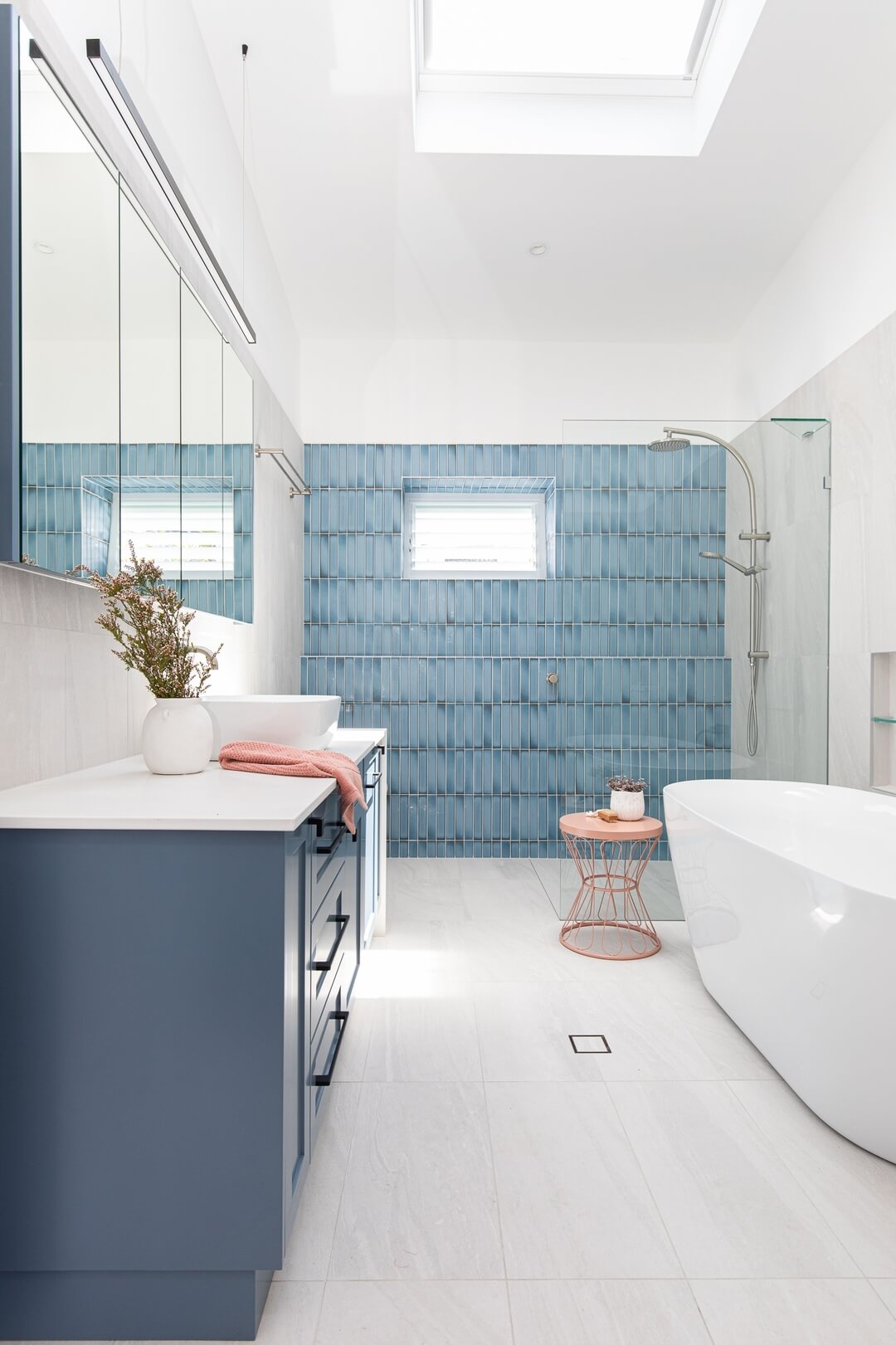 Vertical Blue Stick Tile Creates a Refreshing Shower Accent