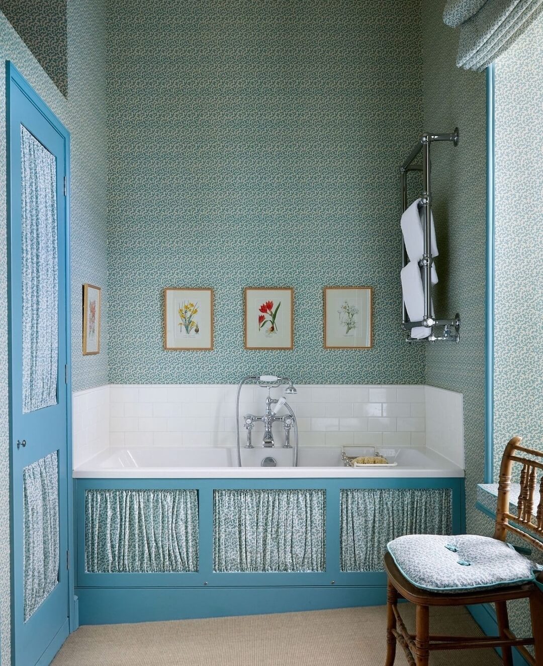 Blue Bathroom Vanity Features Draped Fabric Panels