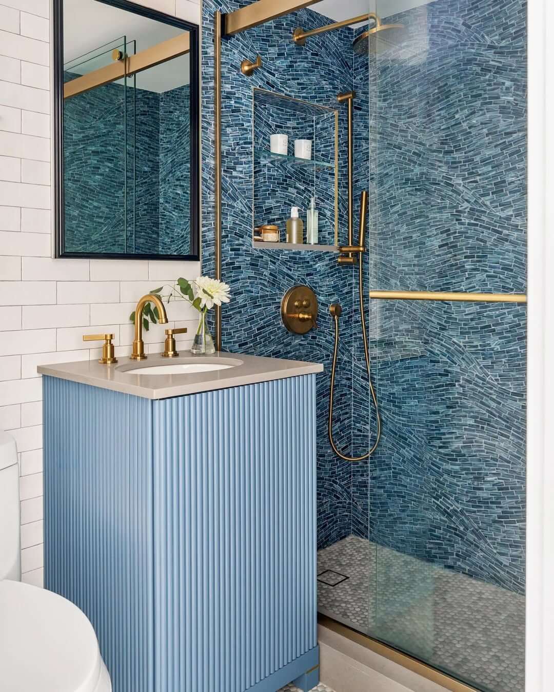 Ribbed Powder Blue Vanity Pairs with Gold Fixtures