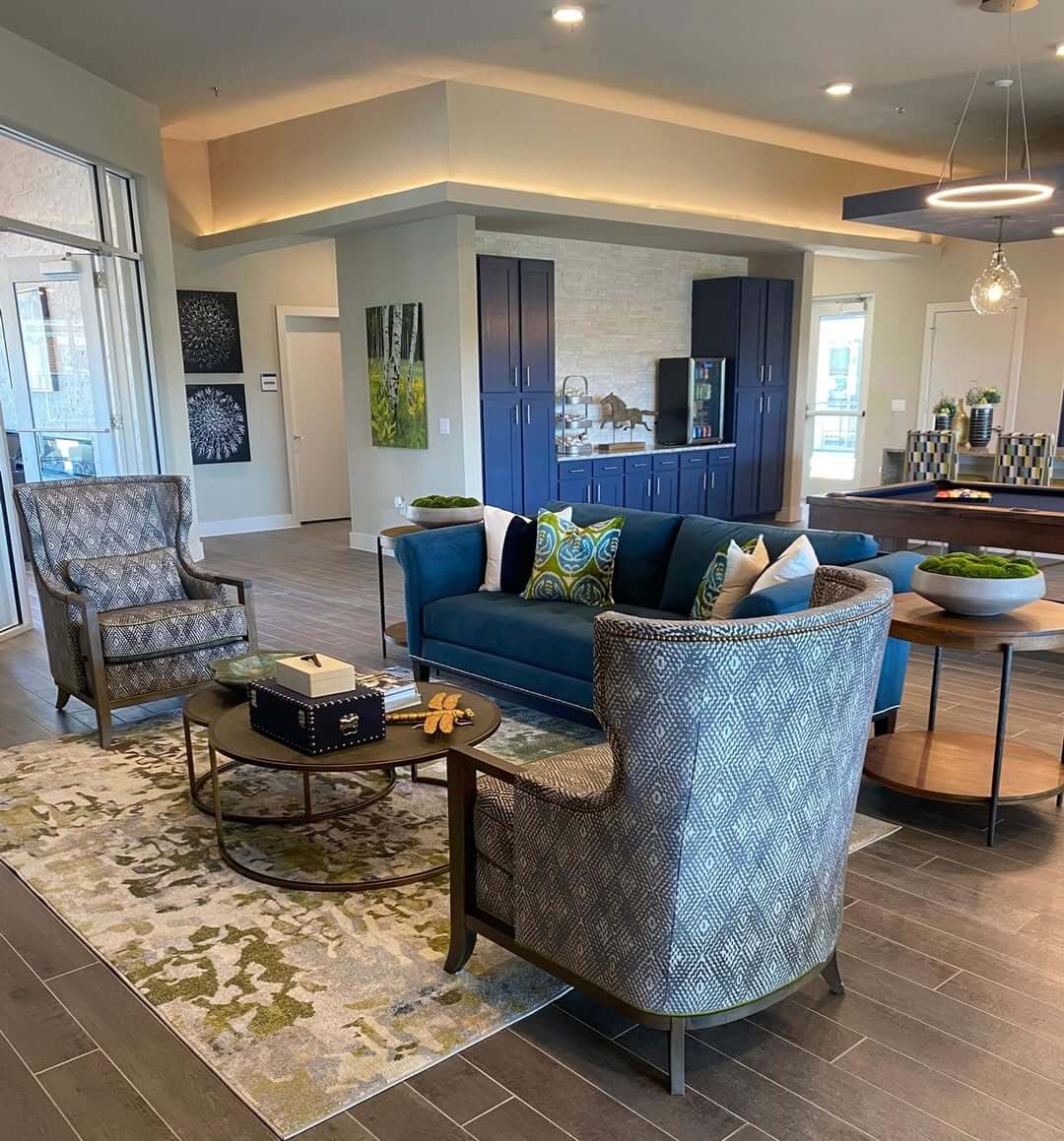 Patterned Armchairs Complement Blue Sofa and Abstract Rug