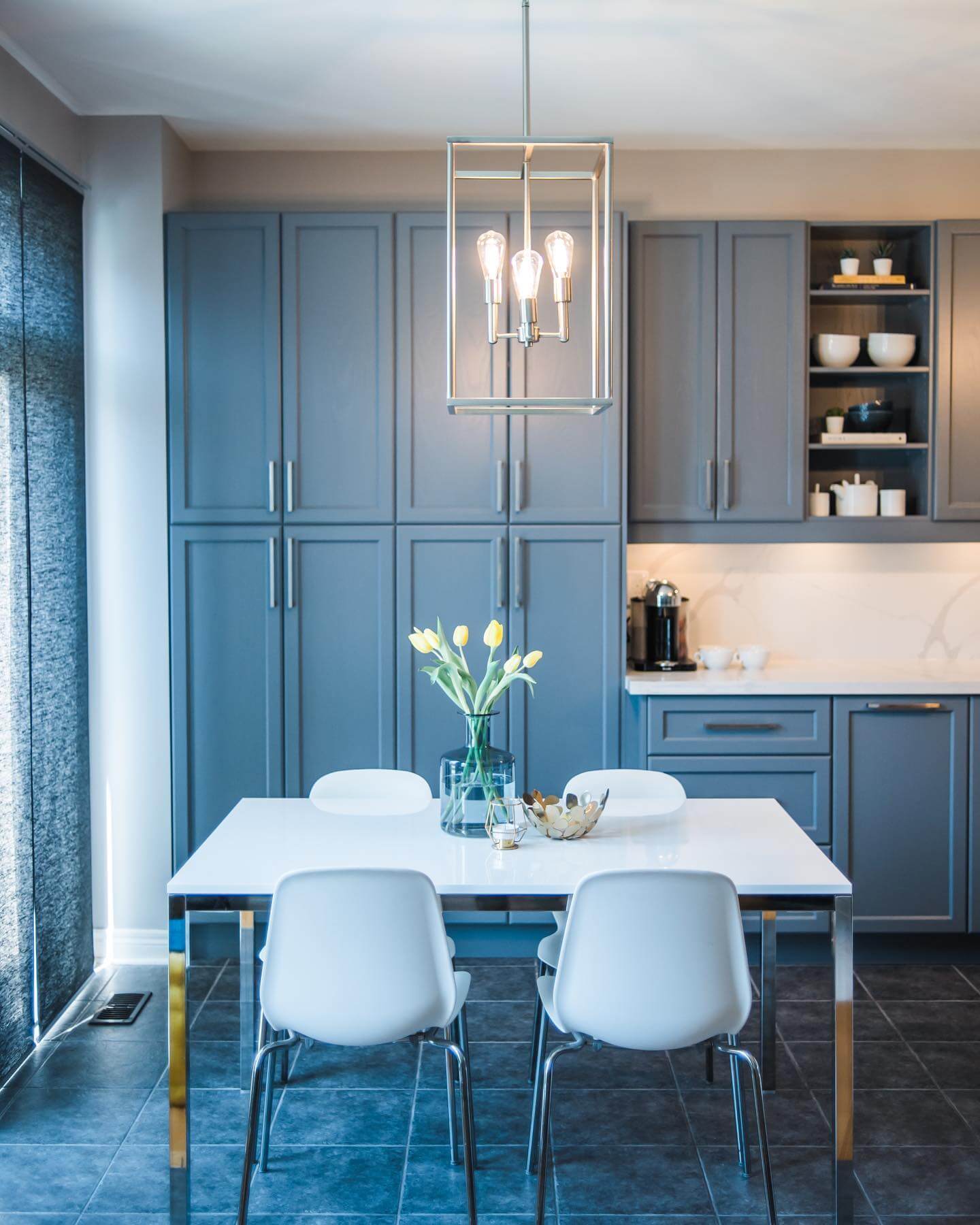Frame a Dining Nook with Matte Blue Cabinets