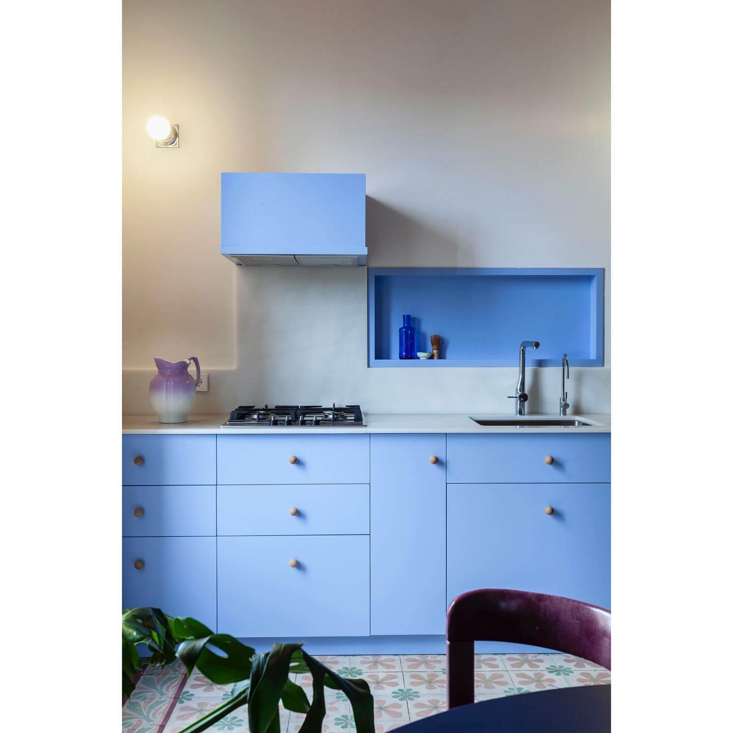 Keep the Counter Clear with a Recessed Blue Niche