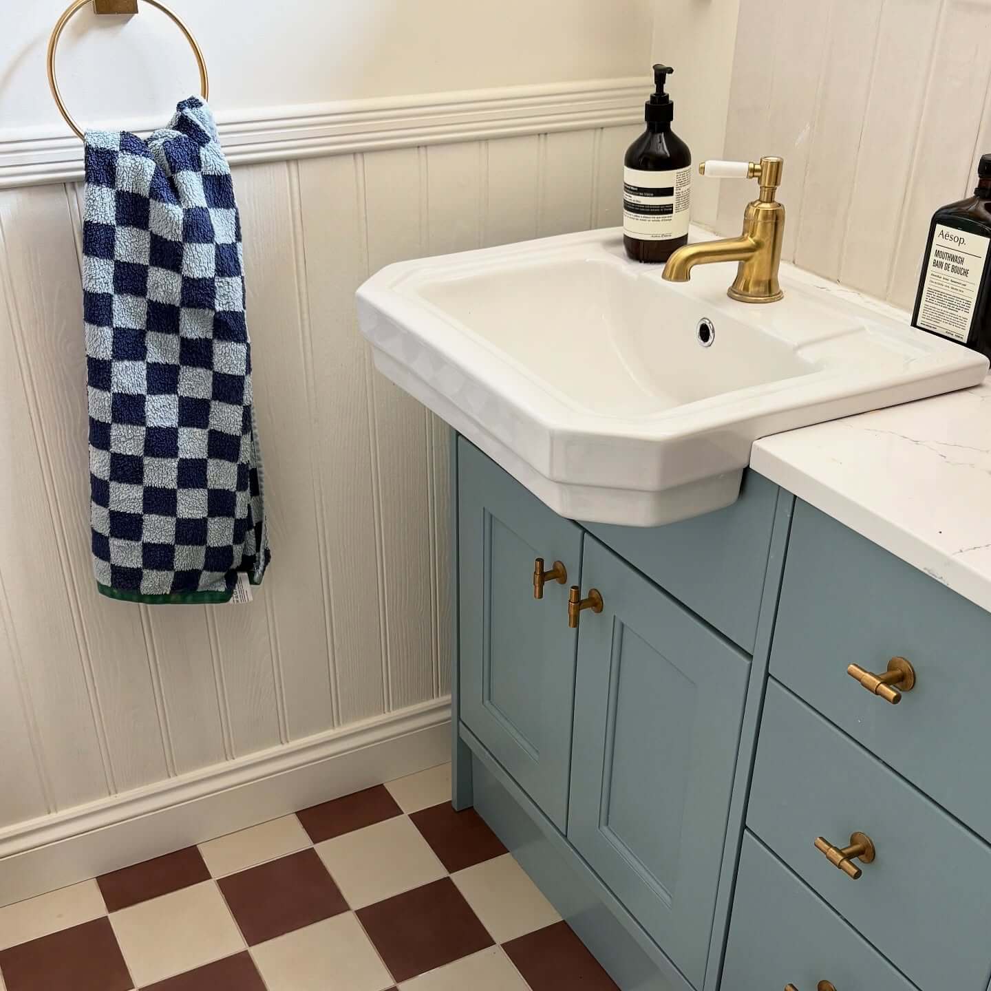Blue Shaker Vanity With T-Bar Drawer Pulls Adds Subtle Detail