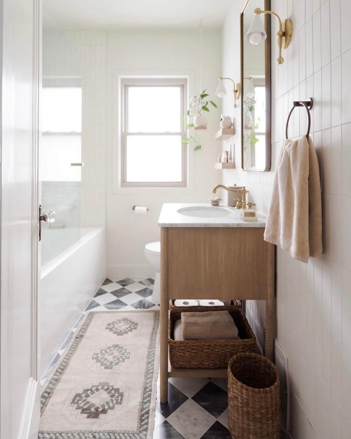 Woven Baskets Hold Towels and Toilet Paper