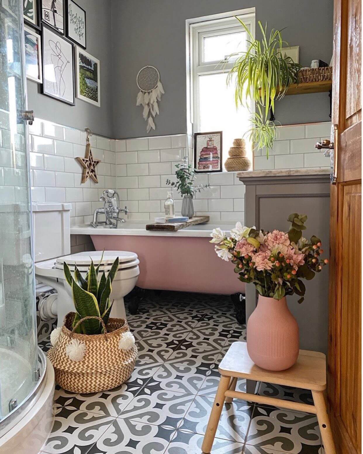 Pink Ceramic Vase Holds a Lush Floral Arrangement