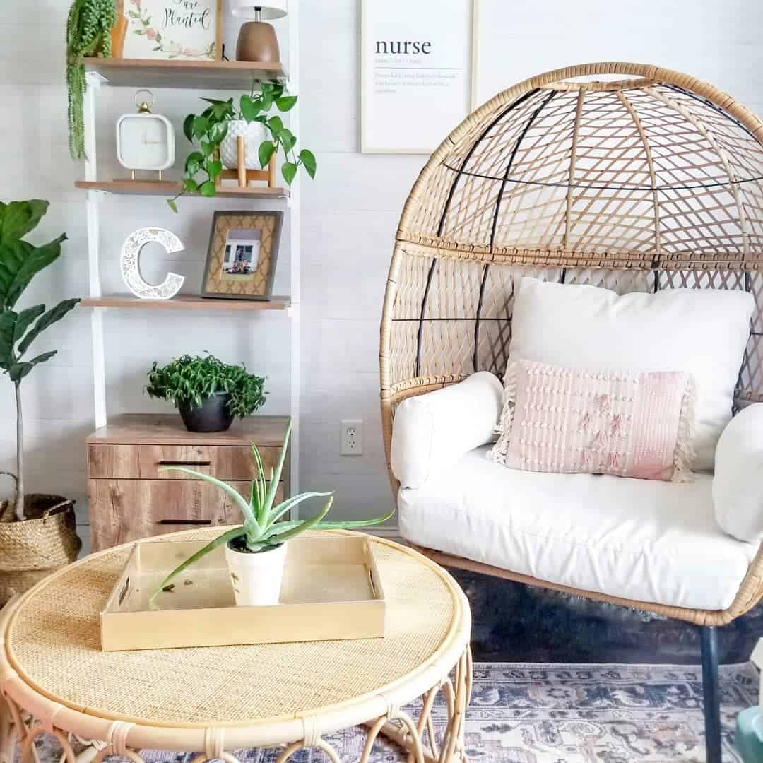 Woven Egg Chair with Blush Pillow Adds Cozy Seating
