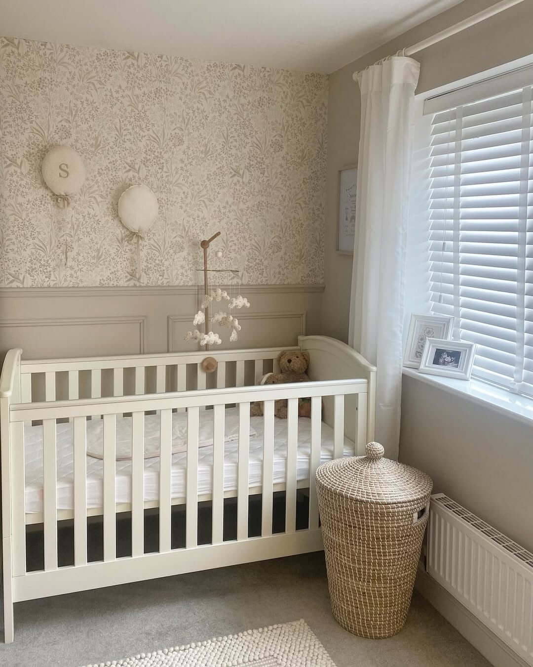 Neutral Floral Wallpaper Adds Soft Texture Above Paneling