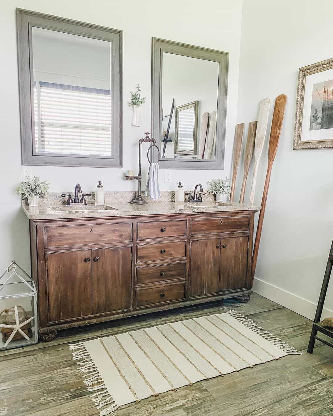 Leaning Oar Decor Adds Rustic Nautical Flair to Bathroom Corner