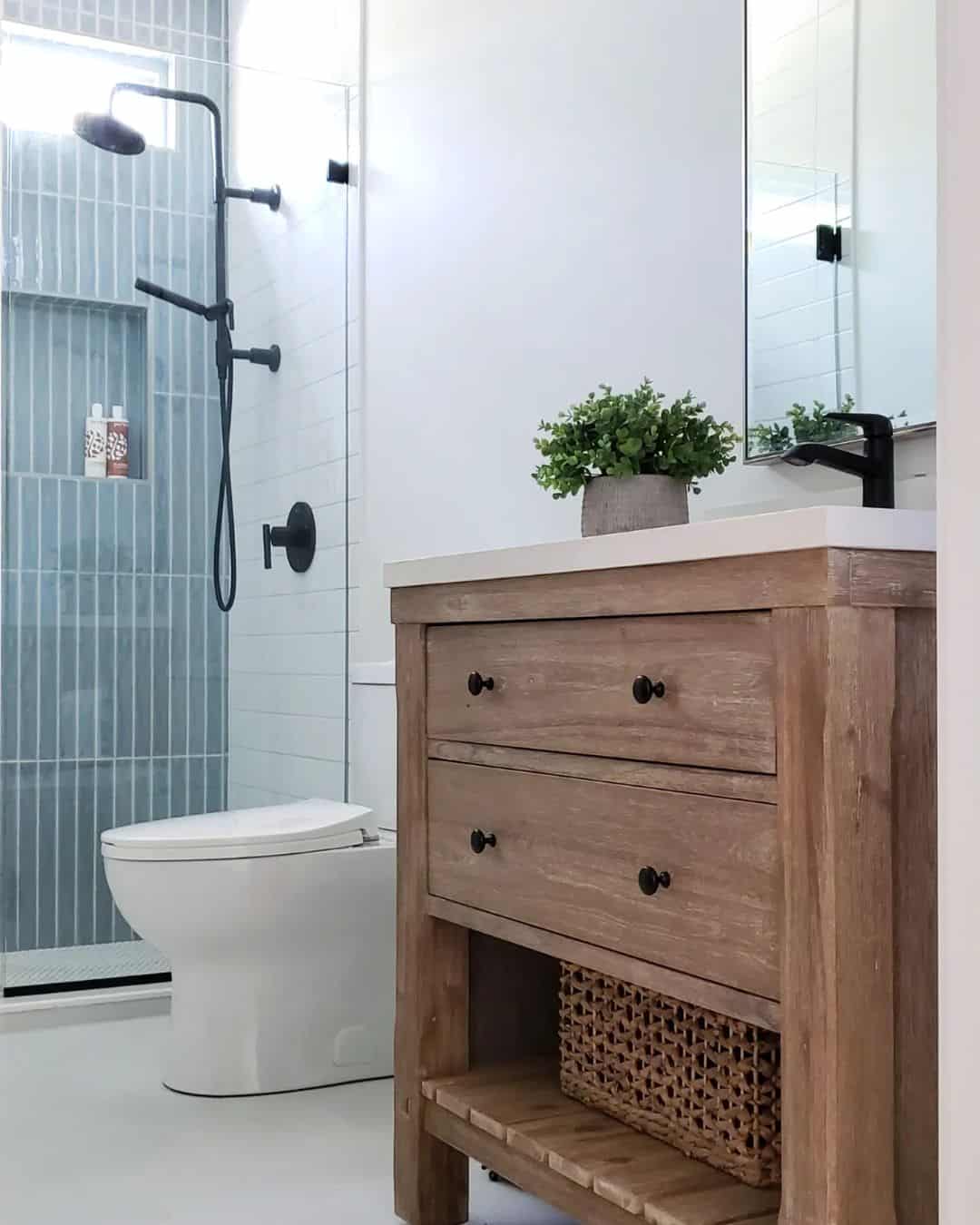 Vertical Blue Glass Tile Creates a Spa-Like Shower