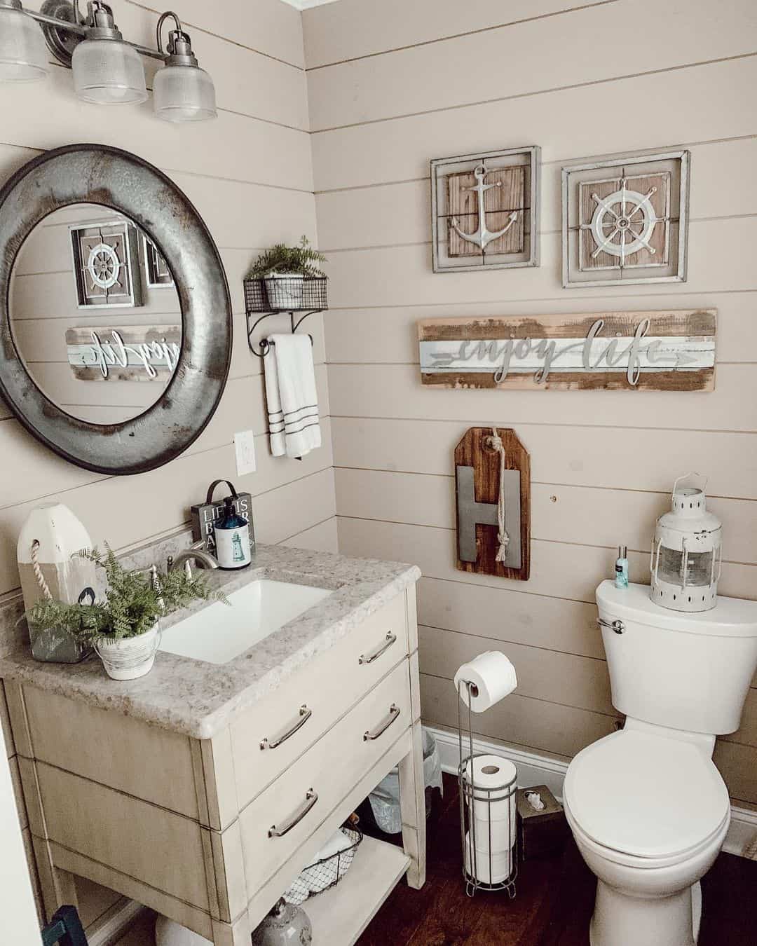 Wooden Wall Art With Nautical Icons Creates a Layered Display