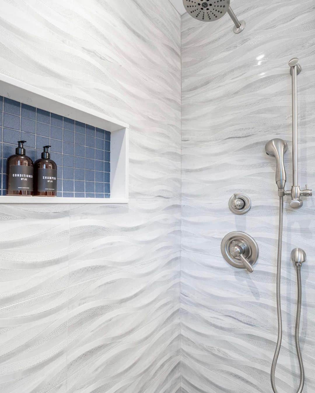 Textured Wave Tile Creates a Soothing Shower Ambiance