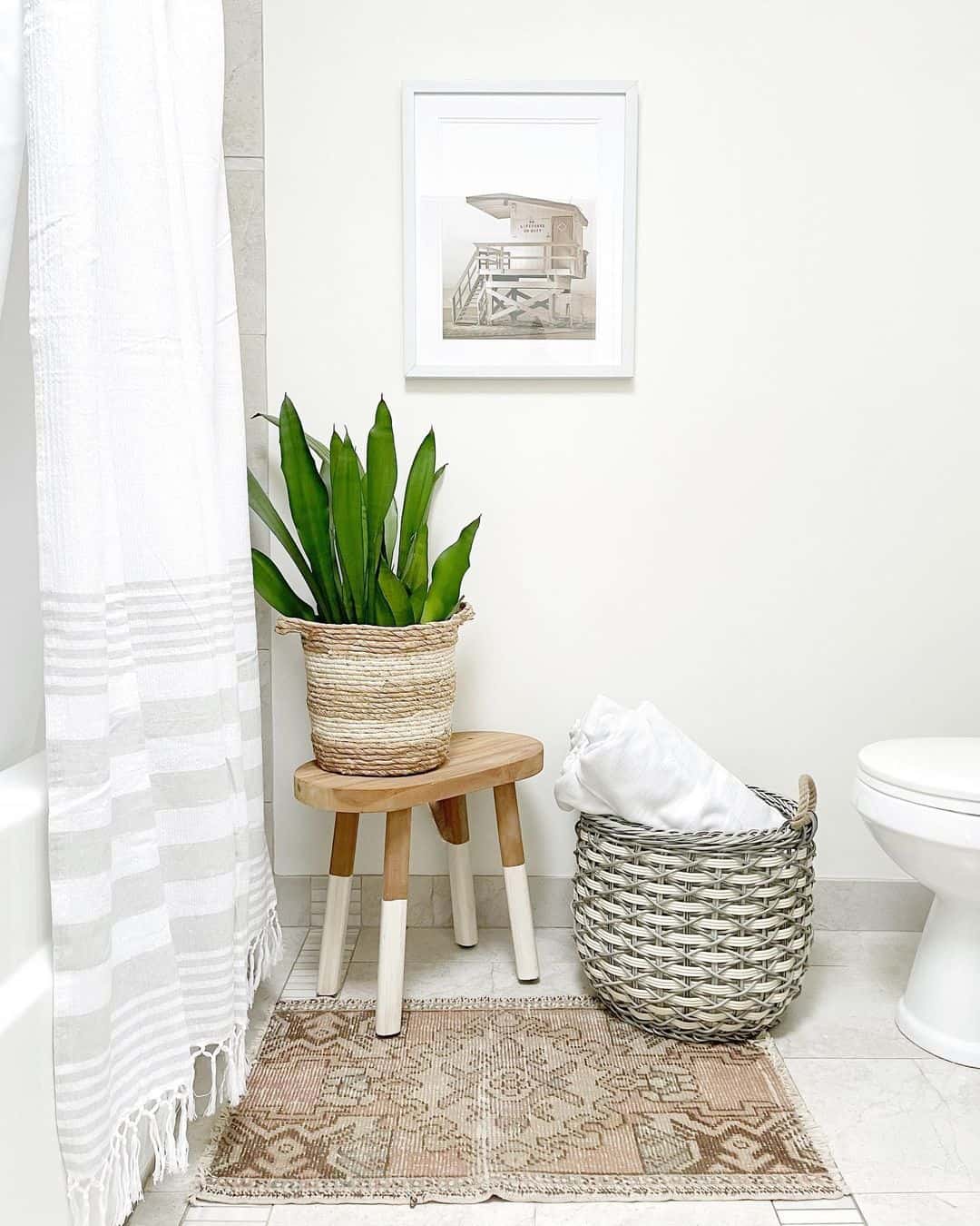 Coastal Lifeguard Stand Art Adds Beachy Vibe Above Tub