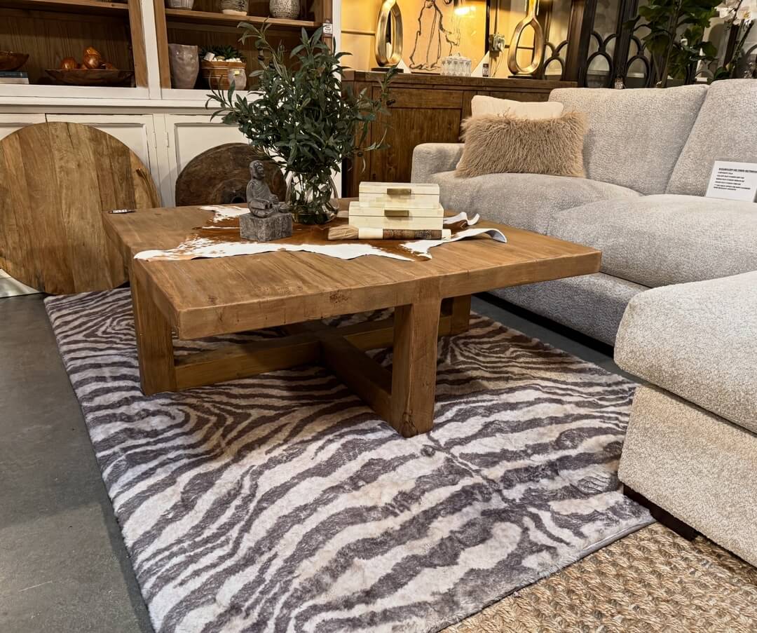 Natural Hide Runner Tops a Rough-Hewn Wood Table