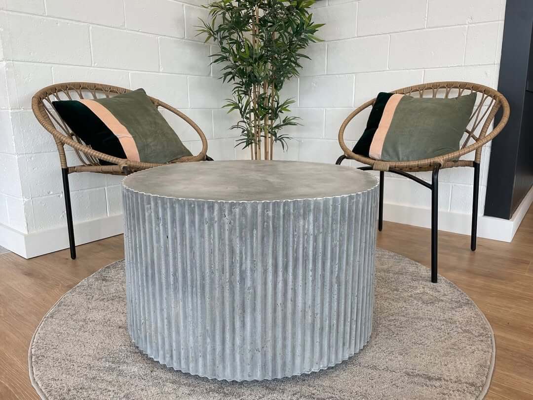 Fluted Concrete Drum Table Offers Industrial Texture