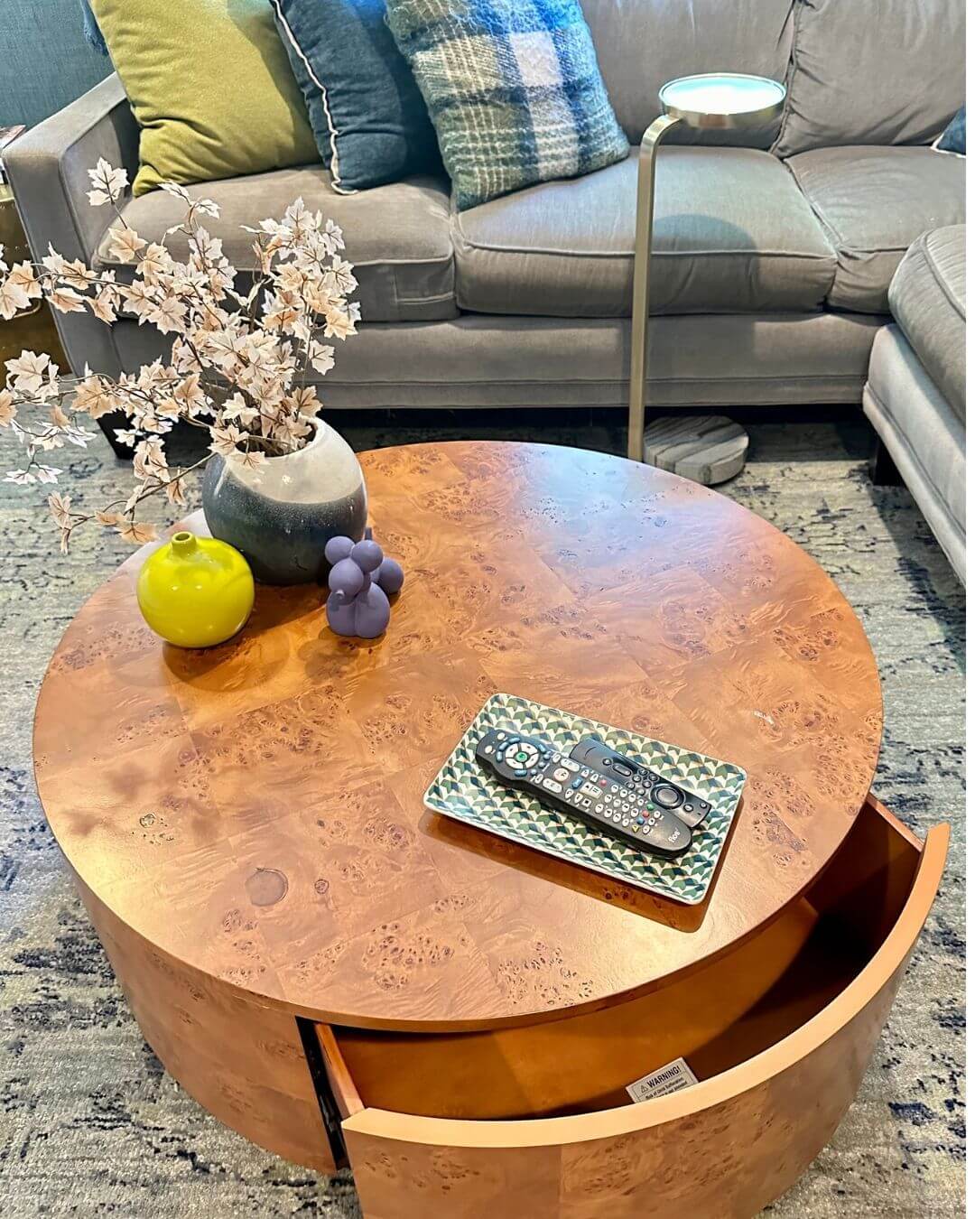 Hide Remotes in a Round Table's Secret Drawer