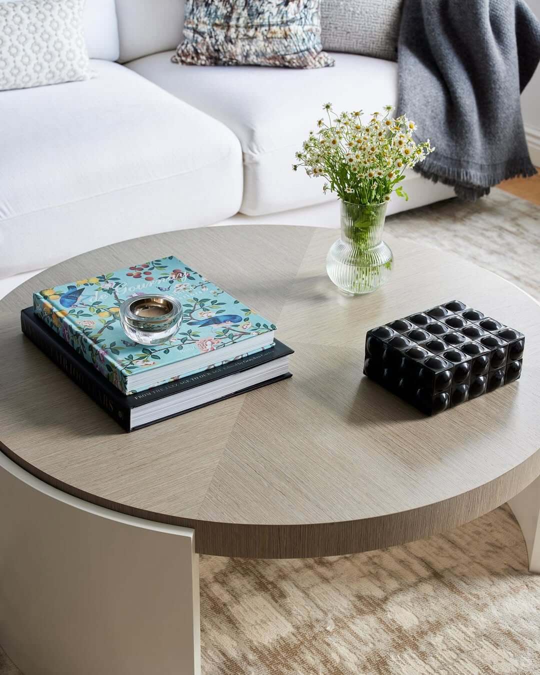 Stack Books and a Glass Vase for a Fresh Vignette