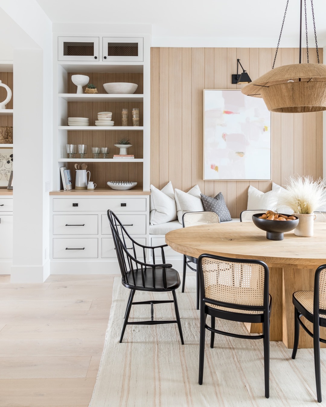 Introduce Soft Color Above a Banquette with Abstract Art