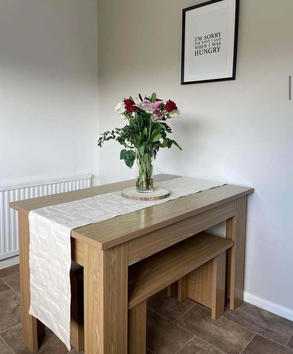 Clear vase of mixed blooms adds a fresh focal point