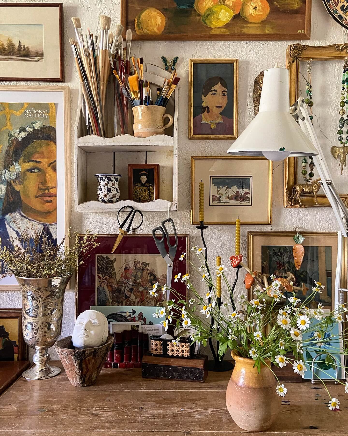 Displaying art supplies and found objects as decor