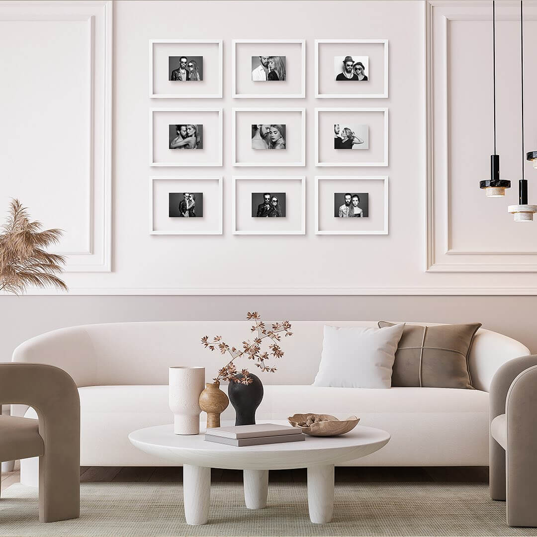 Grid of Identical White Frames Creates a Modern Gallery Wall