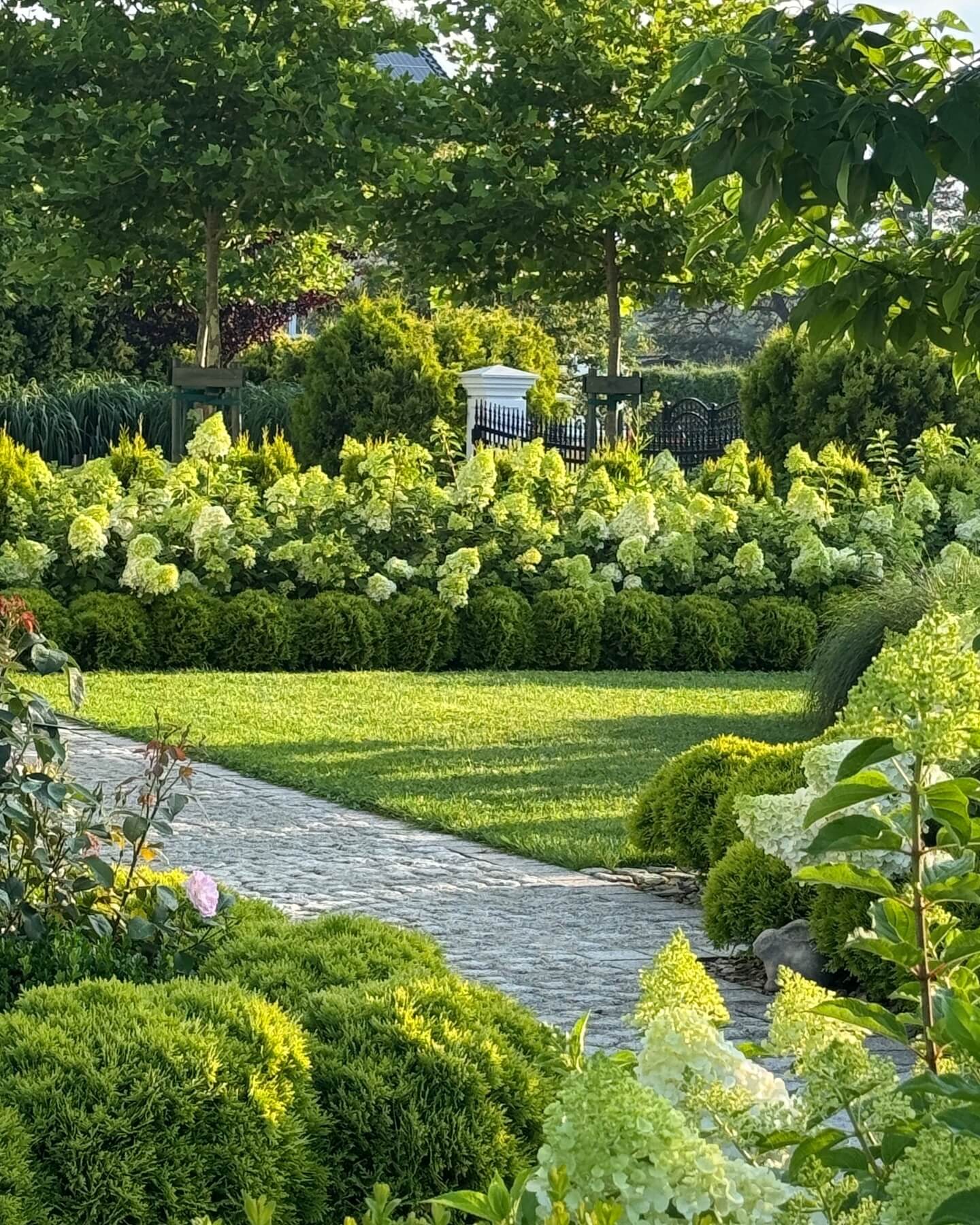 Layer Greenery to Soften Garden Paths