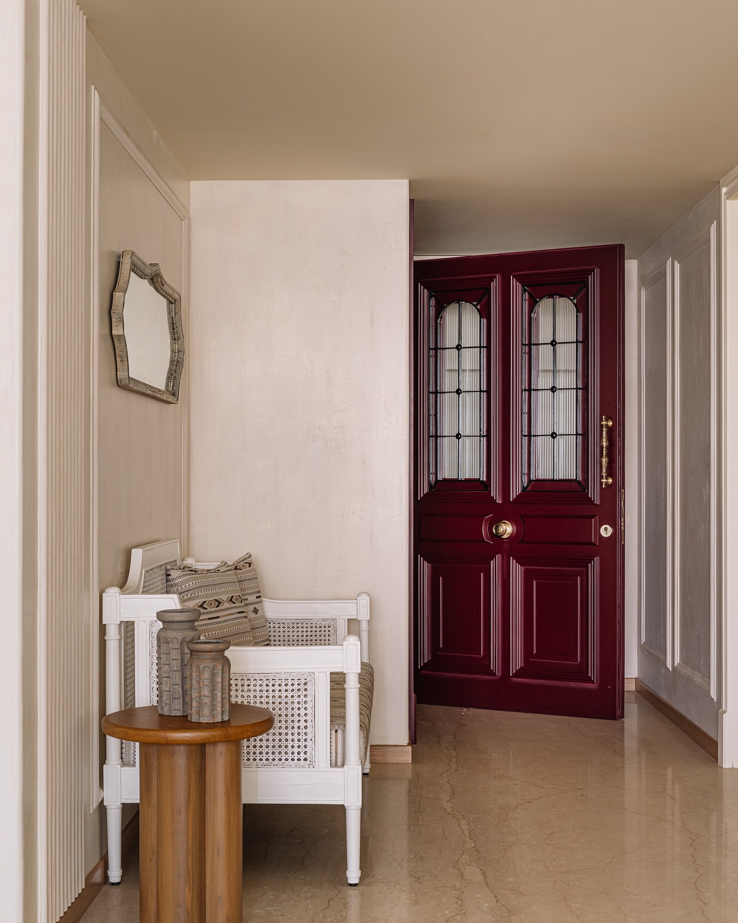 Cane Bench and Textured Vases Create a Cozy Nook