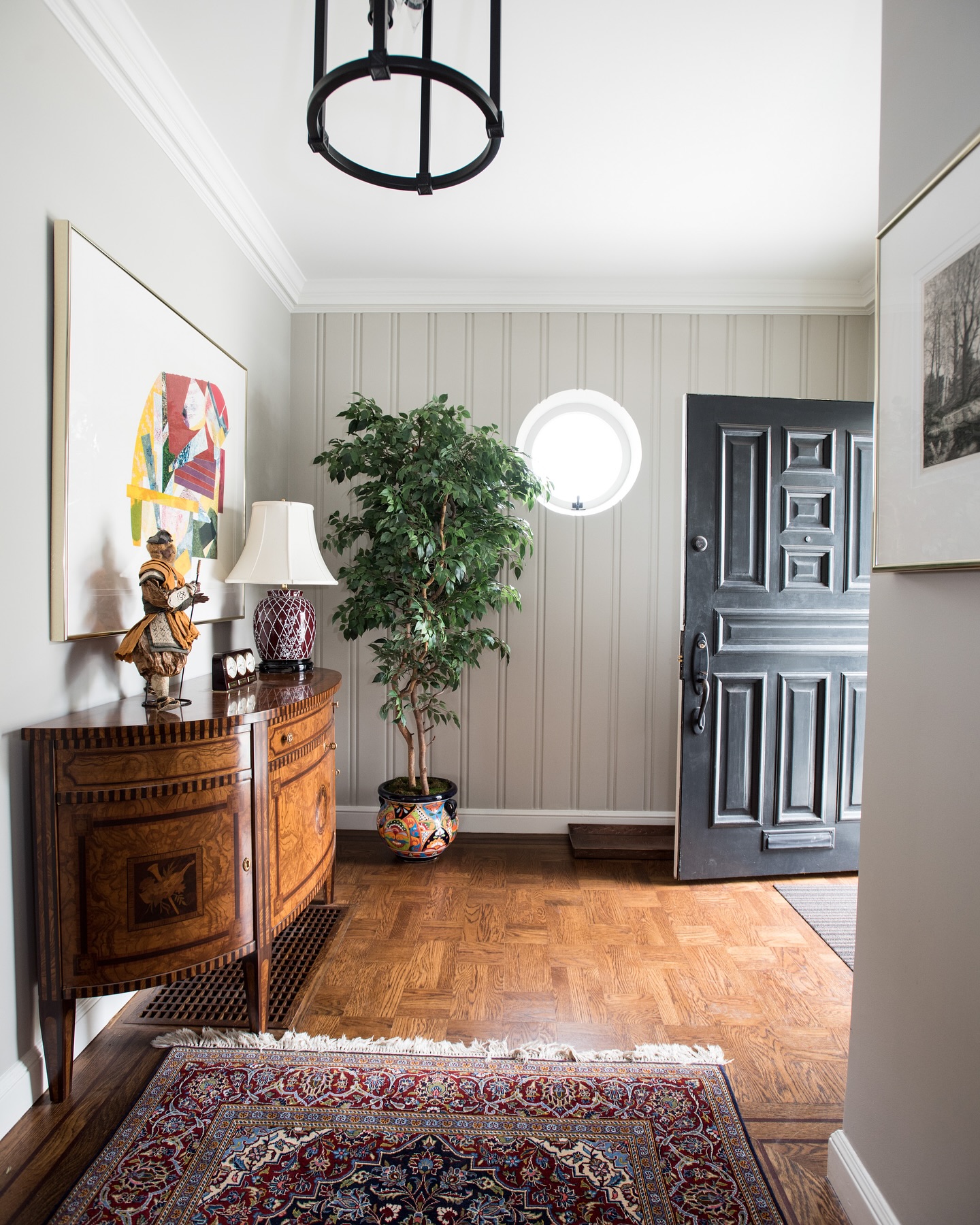 Ground Your Entryway with a Curved Walnut Cabinet