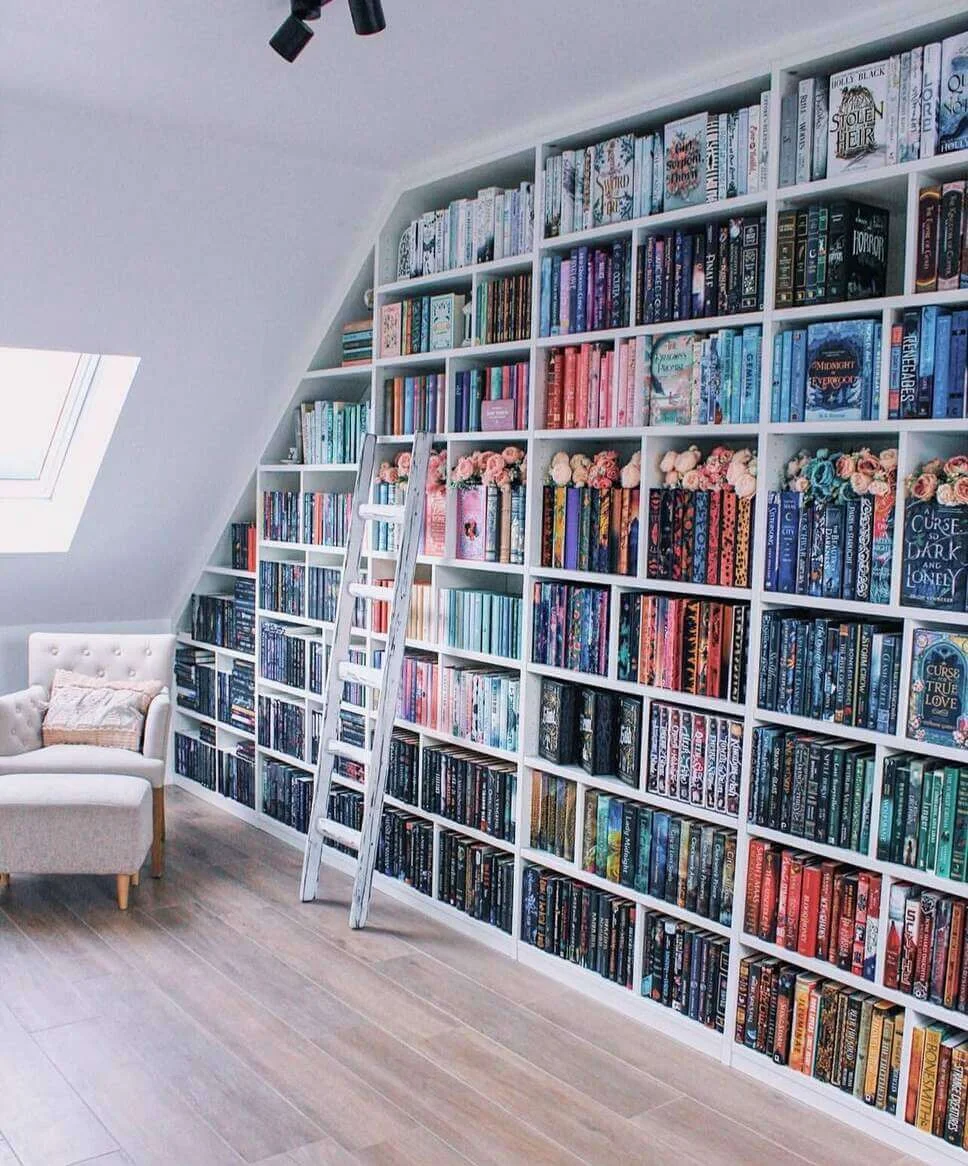 Tuck Faux Flowers Between Book Stacks for Whimsical Accents