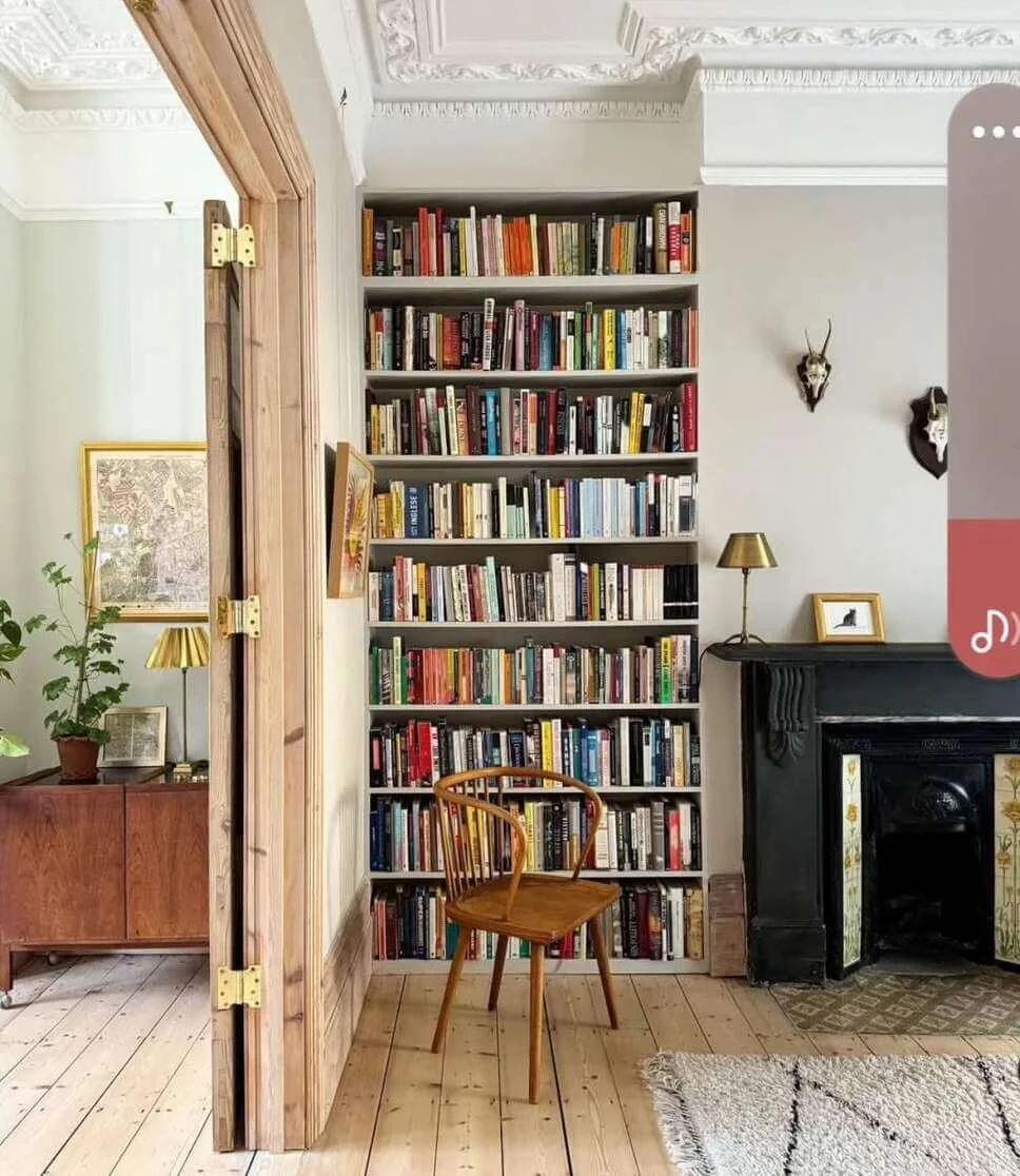 Frame Your Reading Chair With Tall White Bookshelves