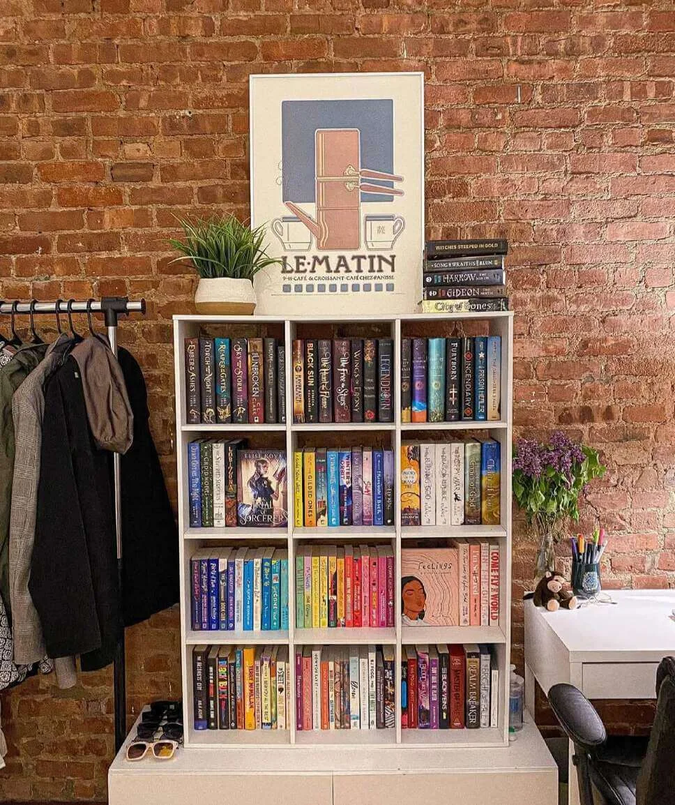 White Cube Shelving Unit Holds a Colorful Book Collection