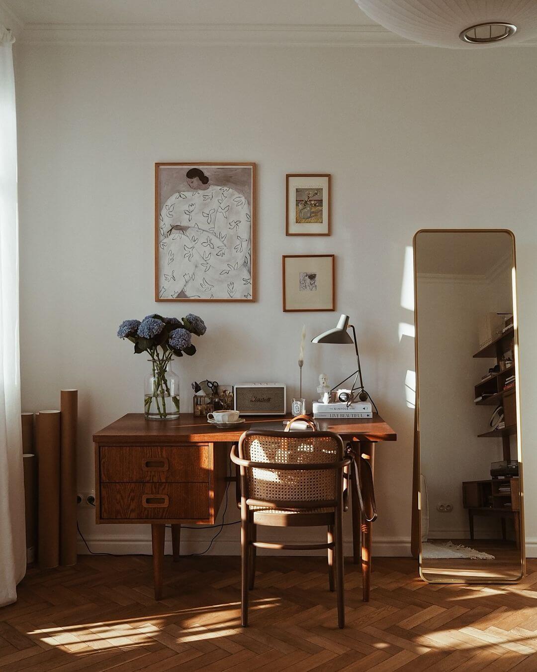 Gallery Wall of Art Adds Personality Above a Mid-Century Desk