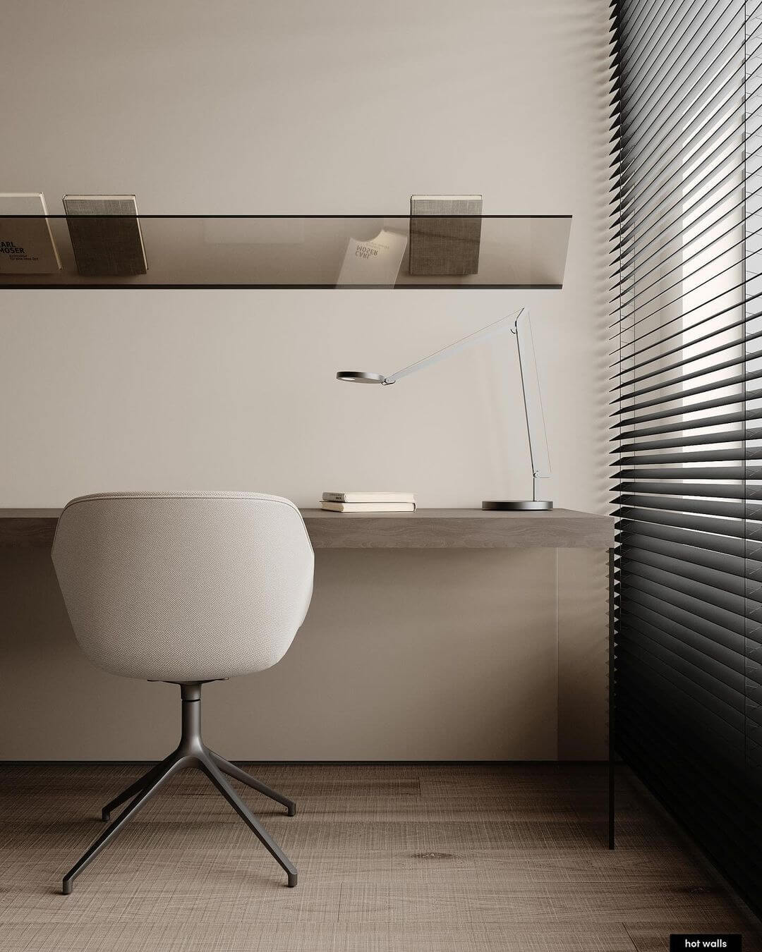 Tinted Glass Shelf Holds Books Above a Minimalist Desk