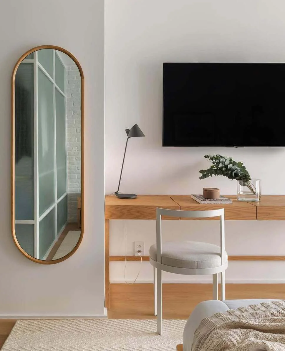 Tall Oval Mirror Adds a Soft, Full-Length Design Element