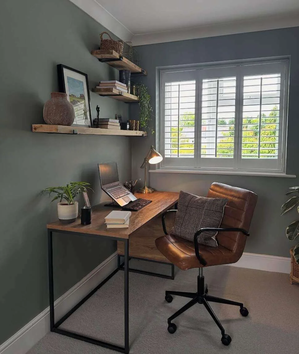 Rustic wooden shelves hold a mix of books and decor