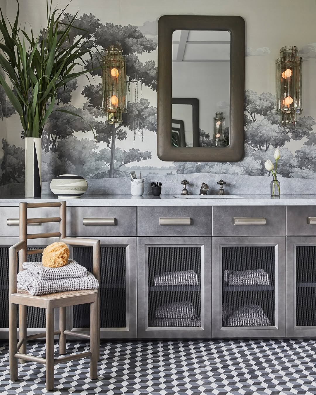 Mesh-Front Grey Cabinets Offer a Peek at Folded Towels
