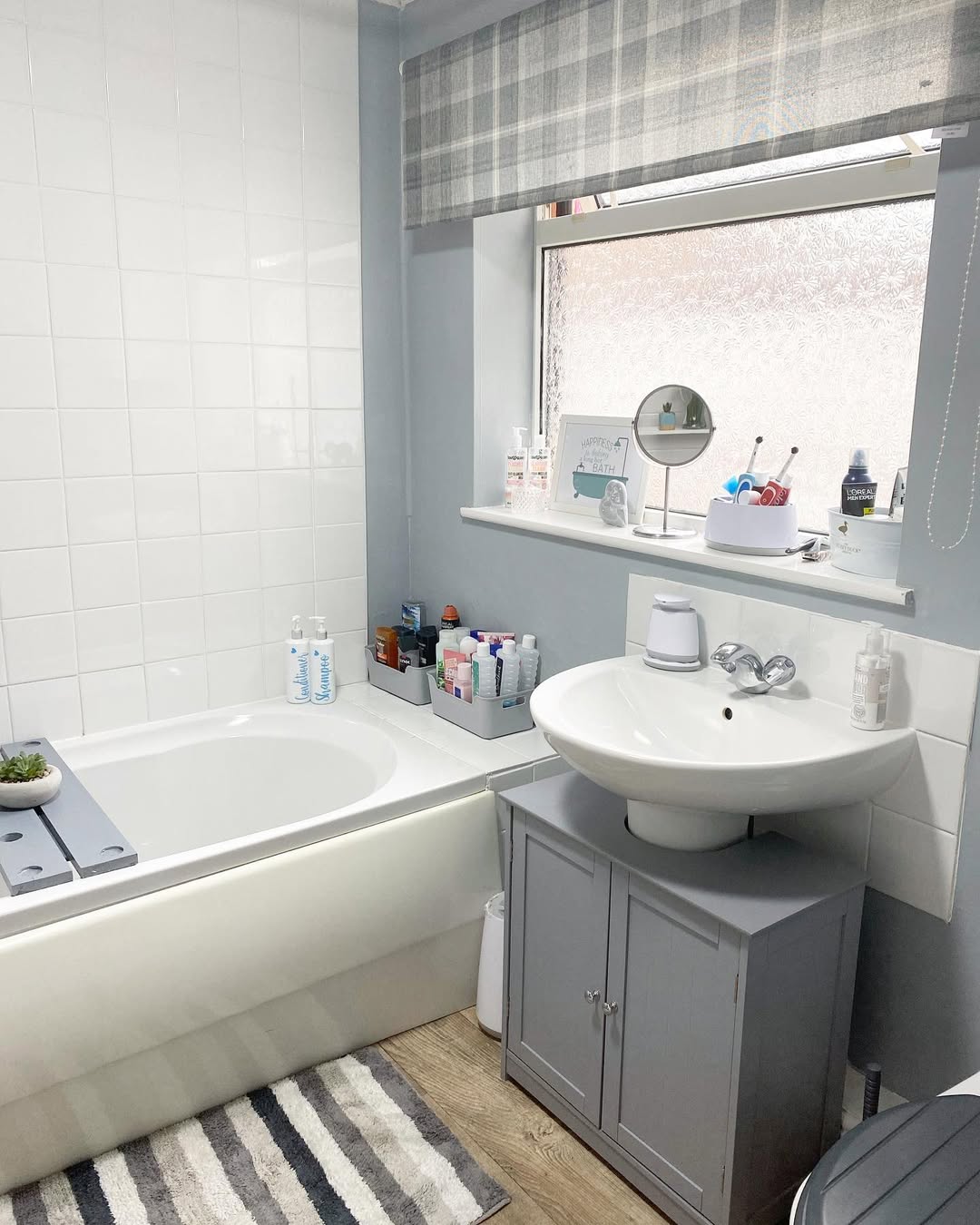 Conceal Clutter with a Compact Grey Two-Door Vanity