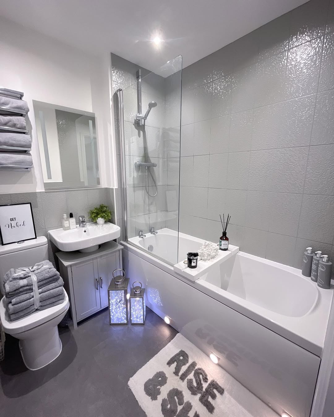Grey Bathroom Vanity With Two-Tone Textured Tiles