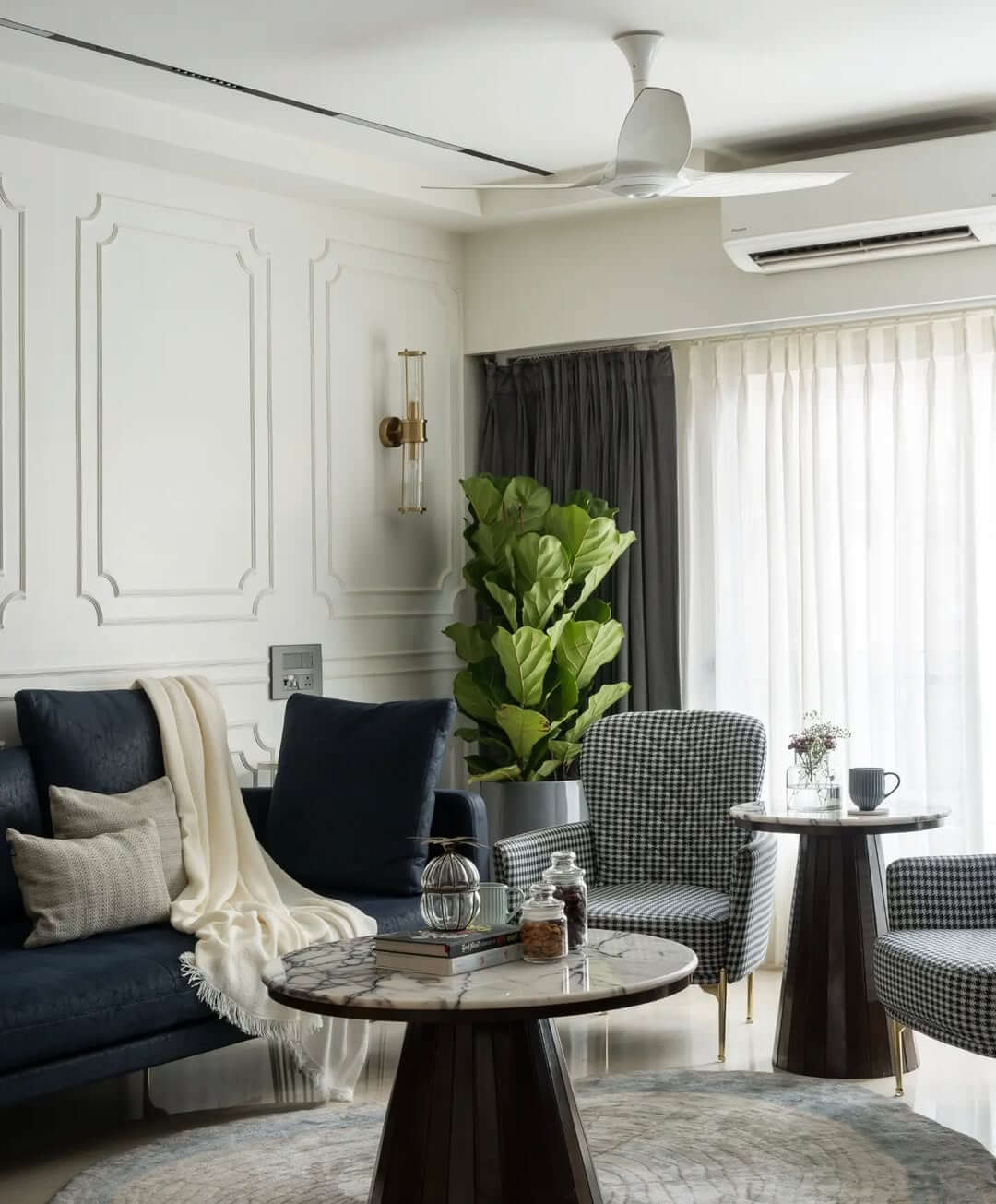Layered Pedestal Tables Add Depth to Seating Area