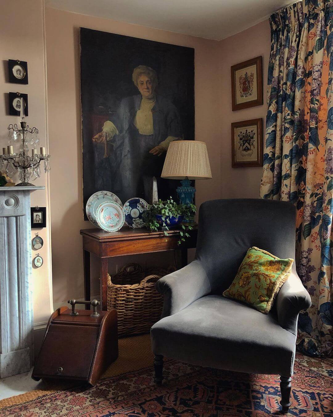 Oversized Portrait Anchors a Cozy Reading Nook